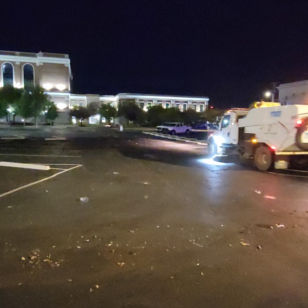 Sweeping the downtown Paxton Lot early in the morning (9 October)