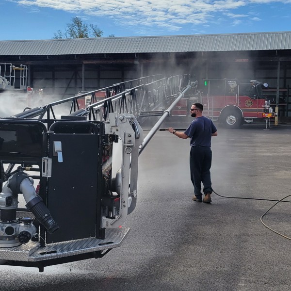 Cleaning one of the BGFD Aerial Trucks at Fleet (18 September)