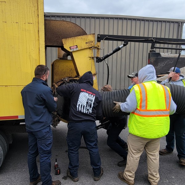 Team effort- Fleet mechanics and Ops crews combine to repair a leaf machine (21 November)